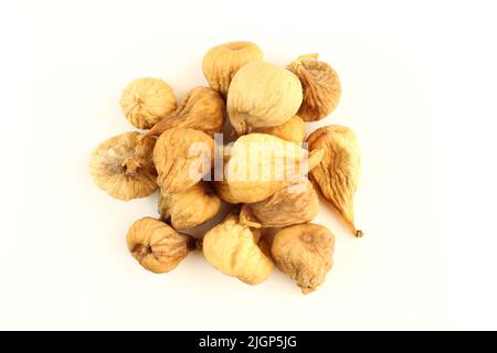Pile of dry old figs isolated on white background. Stock Photo