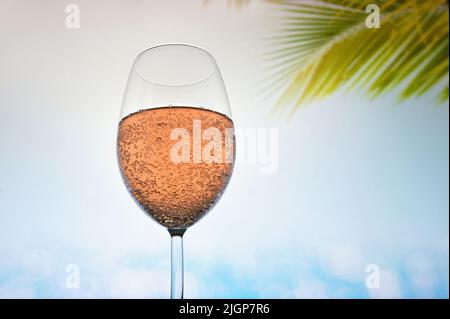 Glass Of  Rose Champagne Sparkling Wine in Summer Stock Photo