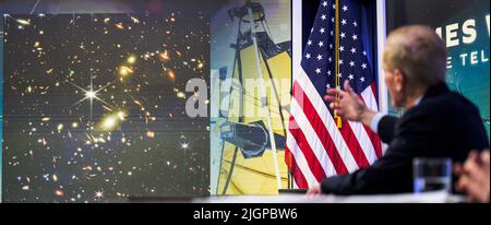 WASHINGTON, D.C., July 12, 2022 (Xinhua) -- NASA Administrator Bill Nelson describes the first image from the James Webb Space Telescope at the White House in Washington, DC, the United States, July 11, 2022. U.S. President Joe Biden released one of the James Webb Space Telescope's first images in a preview event at the White House on Monday. This first image from Webb is the deepest and sharpest infrared image of the distant universe to date, NASA said. This image of galaxy cluster SMACS 0723 is filled with thousands of galaxies, including the faintest objects ever observed Stock Photo