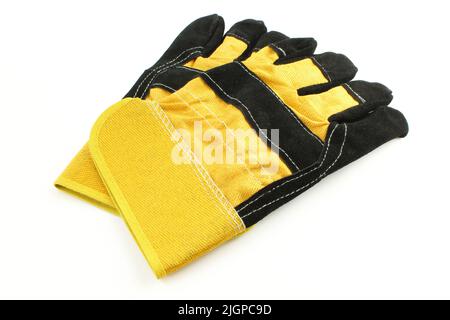 Black and yellow working gloves isolated on white background. Safety work wear Stock Photo