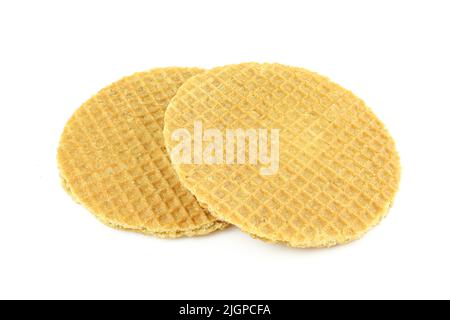 Two whole stroopwafels isolated on white backrgound. Golden colour caramel waffles Stock Photo