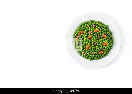Green peas with serrano ham and carrot isolated on white background Stock Photo