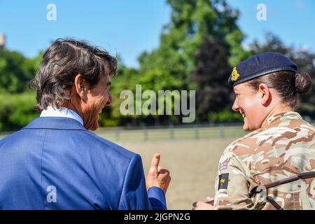 Windsor Castle, Windsor, Berkshire, UK. 8th July 2022. EMBARGOED UNTIL 12th JULY  Tom Cruise meeting members of the King's Troop Royal Horse Artillery, who he introduced during the Platinum Jubilee Celebration back in May, on a private visit in the Private Grounds of Windsor Castle   Credit:Peter Nixon/Alamy Live News Stock Photo