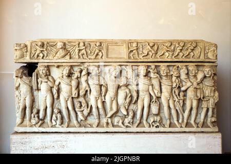 Sarcophagus representing drunken Dionysus held up by a Satyr and the Seasons. Luni marble. First decades of the 4th century AD -Unknown provenance - National Roman Museum - The Baths of Diocletian - Rome, Italy Stock Photo