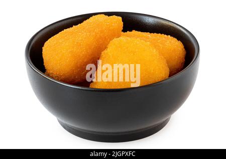 Fried breaded brie nuggets in a black ceramic bowl isolated on white. Stock Photo