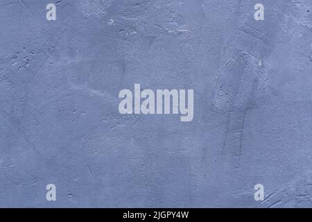 Old gray concrete wall. The plaster was applied to the wall with uneven, sloppy strokes. Vintage abstract background. Can be used for vinyl backdrops. Concrete texture. Stock Photo