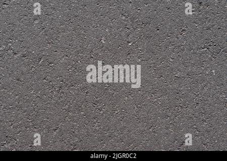 Close up of black asphalt road texture. Dark asphalt background for your project Stock Photo