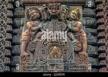 07 21 2007 Stone sculpture on outside wall of Mukteshwar Temple Bhubaneswar Orissa Orissa India Stock Photo