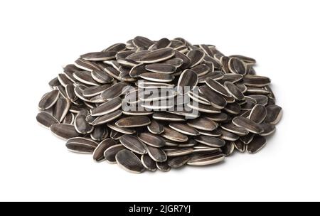 Pile of fresh raw sunflower seeds isolated on white Stock Photo