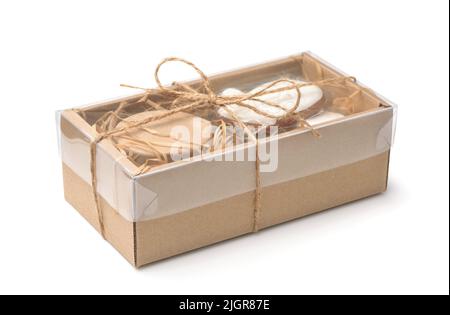 Paper gift box of different handmade sweets isolated on a white Stock Photo