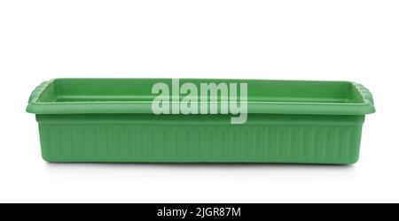 Front view of empty green plastic seedling tray isolated on white Stock Photo