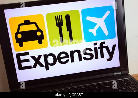 KONSKIE, POLAND - July 11, 2022: Expensify software company logo displayed on laptop computer screen Stock Photo