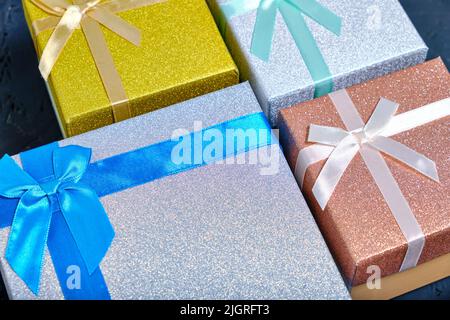 Multi colored gift boxes with bows different colors Stock Photo