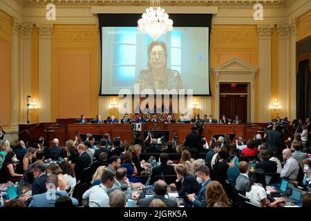 Washington, DC, July 12, 2022, A video of Sidney Powell is shown on a screen during the House Select Committee investigating the Jan. 6 attacks hearing on Capitol Hill, Tuesday, July, 12, 2022. Credit: Doug Mills/Pool via CNP Stock Photo