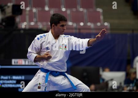 Roman Heydarov from Azerbaijan stands guard during Karate competition with Kata demonstration at The World Games 2022 in Birmingham. The games are a quadrennial international multi-sport event for sports not included in the Olympic Games. Hosting city is Birmingham, Alabama, USA. Stock Photo