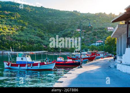 Traditional fishing boats at Steni Vala port the second most populous village on the Greek island of Alonnisos, a picturesque Greek island in Sporades Stock Photo