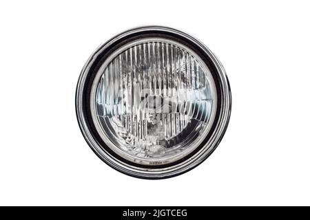 Old round headlight, an old-timer vehicle detail isolated on white background, close up Stock Photo