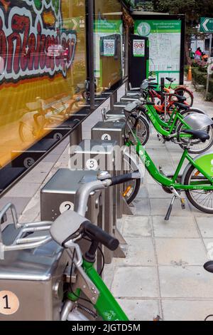 Bicycle and docking station, Sathorn, Bangkok, Thailand Stock Photo