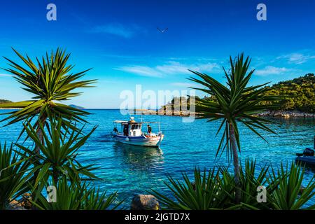 Traditional fishing boats at Steni Vala port the second most populous village on the Greek island of Alonnisos, a picturesque Greek island in Sporades Stock Photo