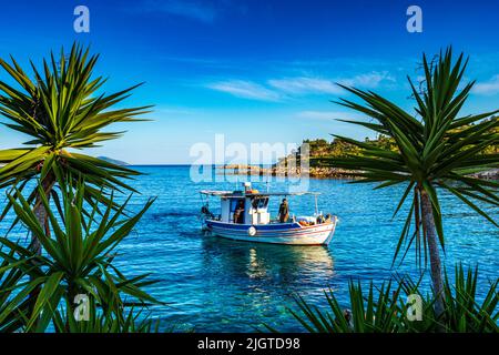 Traditional fishing boats at Steni Vala port the second most populous village on the Greek island of Alonnisos, a picturesque Greek island in Sporades Stock Photo