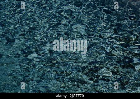 A close up of chlorinated water in a pool. Stock Photo