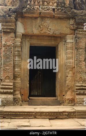 The Intricately carved stone entrance to the temple at Ta Prohm, in Siem Riep, Cambodia. Stock Photo