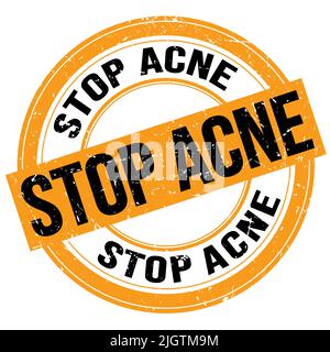 STOP ACNE text written on orange-black round grungy stamp sign Stock Photo