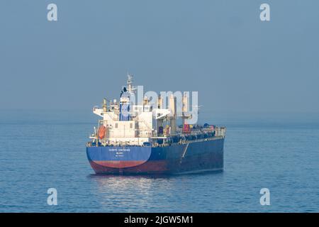 A bulk cargo freighter, the Scorpio Confidence, at anchor in the harbor at Antofagasta, Chile. Stock Photo