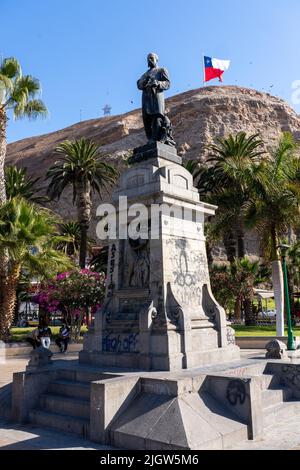 A statue of 19th Century Chilean writer and politician Benjamin Vicuna Mackenna in a public park in Arica, Chile. Stock Photo