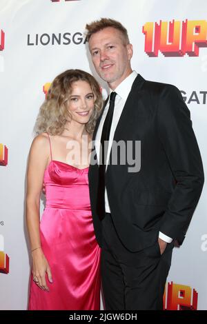 July 12, 2022, Los Angeles, CA, USA: LOS ANGELES - JUL 12:  Cynthia Nabozny aka CYN, Kyle Newman at the 1UP Los Angeles Premiere at Chinese Theater 6 on July 12, 2022 in Los Angeles, CA (Credit Image: © Kay Blake/ZUMA Press Wire) Stock Photo