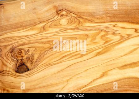 Close-up surface of an olive wood board form market in Apt (Provence/France). Good for background and text space Stock Photo