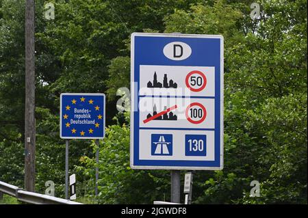 Dasburg, Germany. 09th July, 2022. Sign Federal Republic of Germany and information sign with valid speed limits at the border between Luxembourg and Federal Republic of Germany Credit: Horst Galuschka/dpa/Alamy Live News Stock Photo