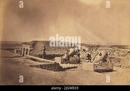 A vintage photo circa 1855 of British soldiers of the Light Division manning mortar batteries in front of Picquet house during the Siege of Sevastopol Crimean war of 1853 to 1856.  Taken by the photographer Roger Fenton Stock Photo