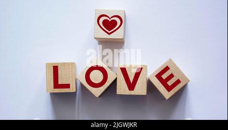 word Love from wooden letters on a wood background Stock Photo - Alamy