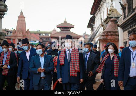 Bhaktapur, Bagmati, Nepal. 13th July, 2022. Liu Jianchao, the head of the International Liaison Department of the Chinese Communist Party along with Chinese ambassador to Nepal Hou Yanqi sightseeing Bhaktapur Durbar Square, one of the World Heritage Site, on Wednesday (Credit Image: © Amit Machamasi/ZUMA Press Wire) Stock Photo