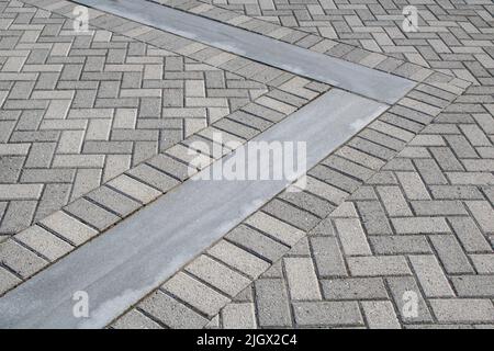 White and grey brick outdoor walkway Stock Photo