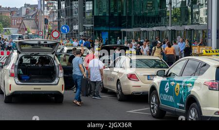 Travelers And Taxi Traffic In Front Of The Entrance To Berlin Central Station Stock Photo