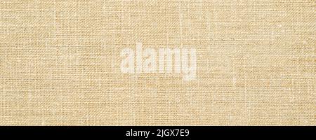 Close-up of undyed cotton canvas fabric texture background Stock Photo