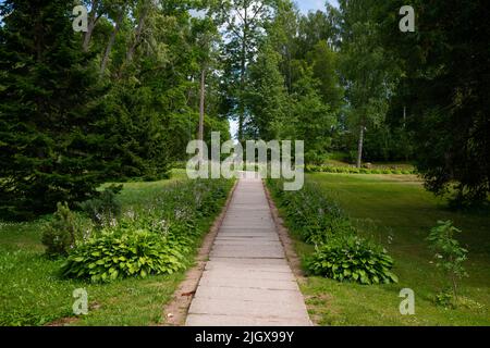 Sideway Path Curved sidewalk, path, trail at the empty street. Neighborhood scenery ...
