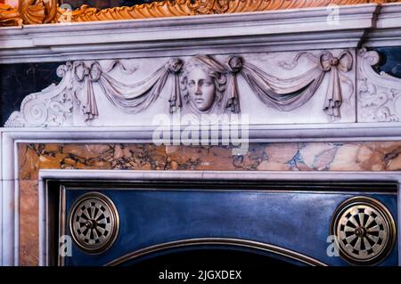 Carved marble mantle on an Irish estate in County Cavan, Virginia Ireland. Stock Photo