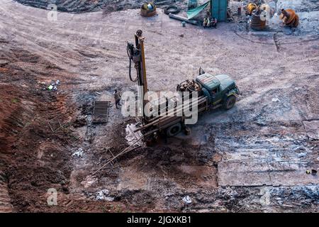 Perm, Russia - July 08, 2022: mobile drilling rig mounted on a truck during operation, top view Stock Photo