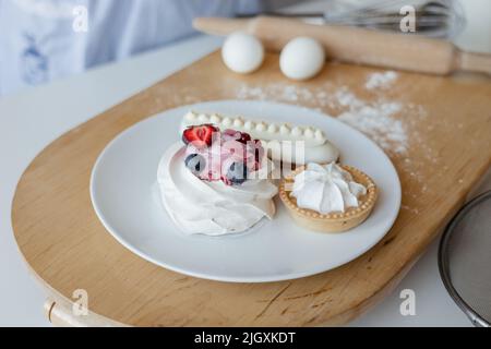 Appetizing cakes on a plate in the kitchen Stock Photo