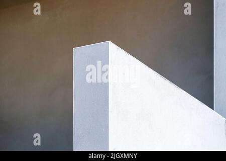 New construction exterior wall with freshly applied stucco to corner beading to all sides of the wall and all others Stock Photo