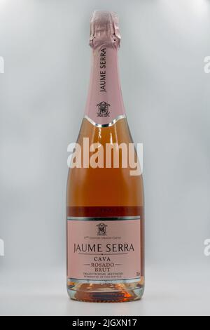 Kyiv, Ukraine - May 08, 2021: Cava Jaume Serra Rosado Brut bottle, Spanish sparkling wine closeup against white. Winery is located in the town of Vila Stock Photo