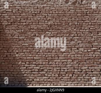 Texture of an old wall made with stone bricks of sandstone in Egypt, Africa Stock Photo