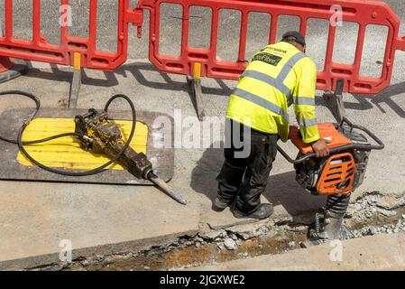 CityFibre full fibre network being installed in Southend on Sea area for Vodafone broadband. Groundworks underway in residential street. Belle Tamper Stock Photo