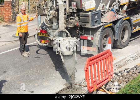 CityFibre full fibre network being installed, Southend on Sea area for Vodafone broadband. Groundworks underway, residential street. Pouring concrete Stock Photo