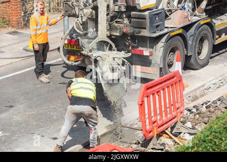 CityFibre full fibre network being installed, Southend on Sea area for Vodafone broadband. Groundworks underway, residential street. Pouring concrete Stock Photo