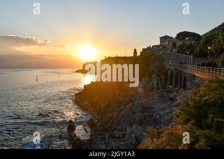 View of the ancient fishing village from the Anita Garibaldi Promenade at sunset, Nervi, Genoa, Liguria, Italy Stock Photo