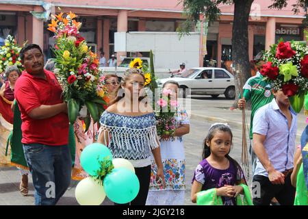 MERIDA, MEXICO - OCTOBER 14, 2016 Los Gremios - Catedral de San Ildefonso - Plaza Grande - women, girls and men Stock Photo